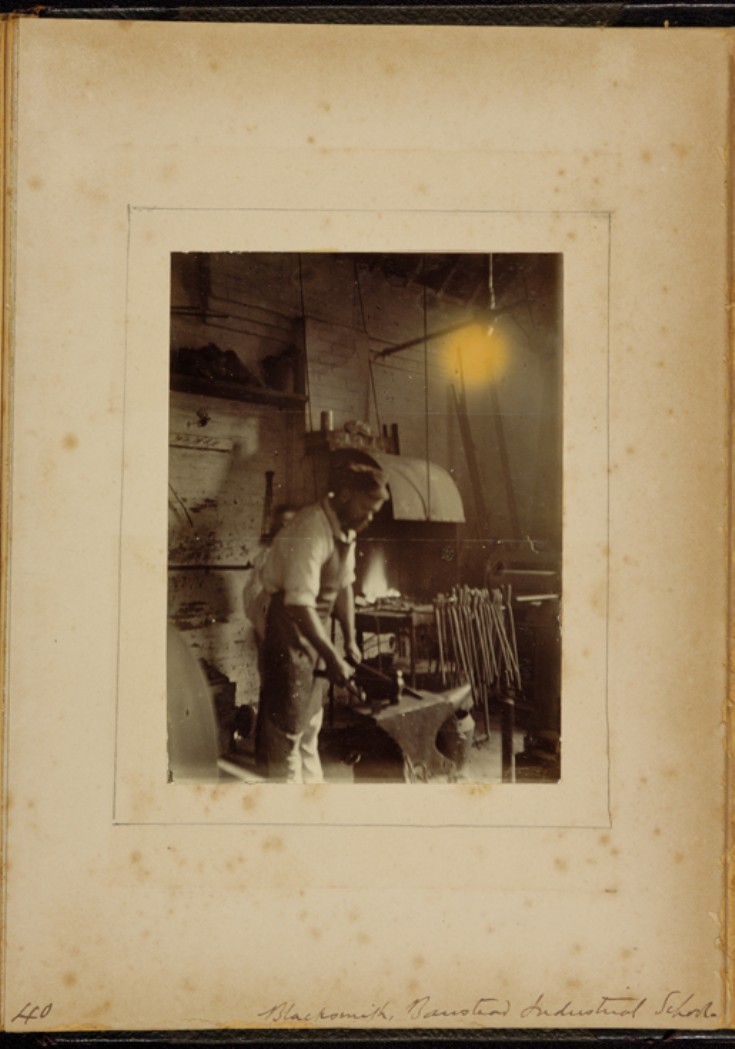 Banstead School - Blacksmith at anvil (full page)