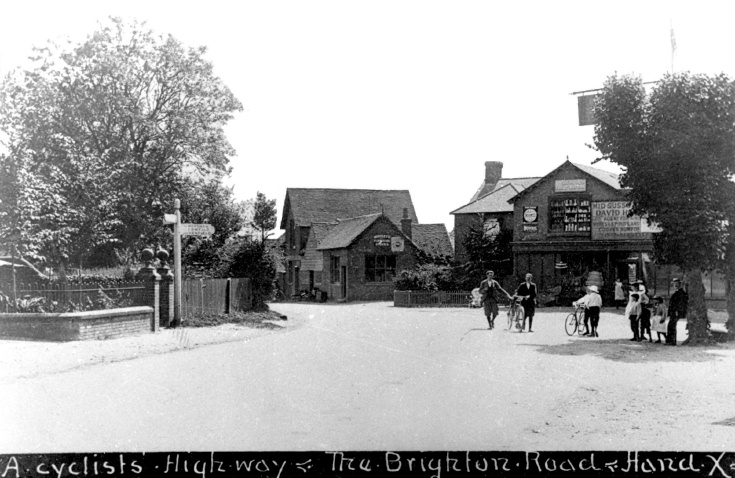 Cyclists in High Street, Handcross