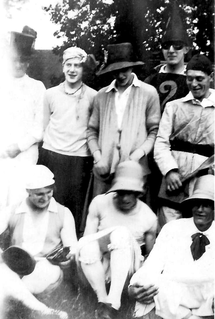 Men's stoolball game in fancy dress