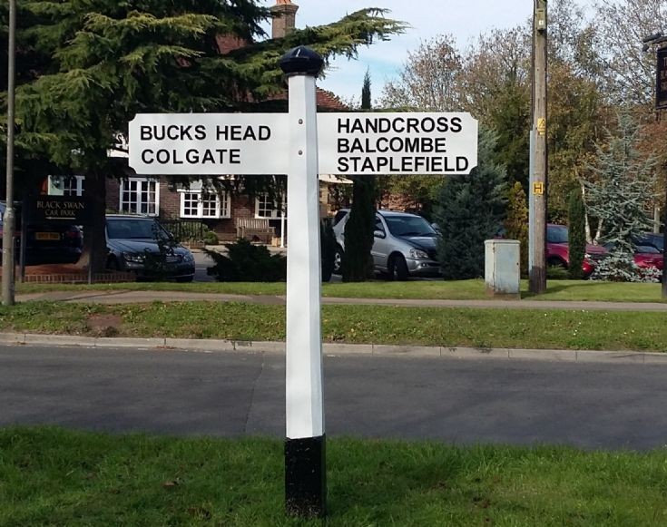 Restored fingerpost at Pease Pottage