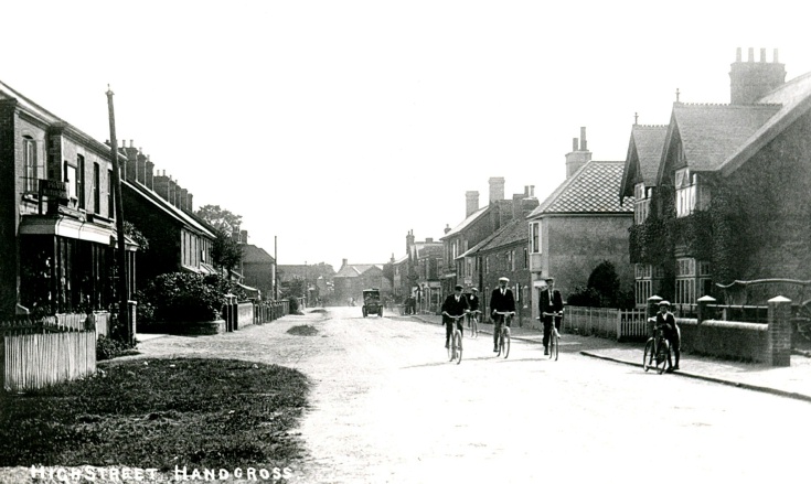 Cyclists outside Robinson Bros, Handcross