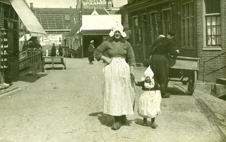 Woman and child in traditional Dutch dress