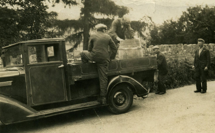 Whisky barrel on back of flat back lorry