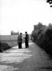 Two men on road - France?